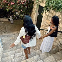 friends walking down stairs outside