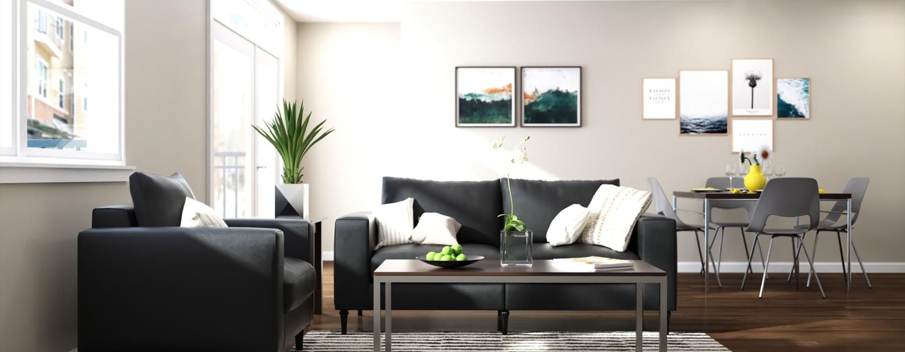 a living room with a couch and chairs